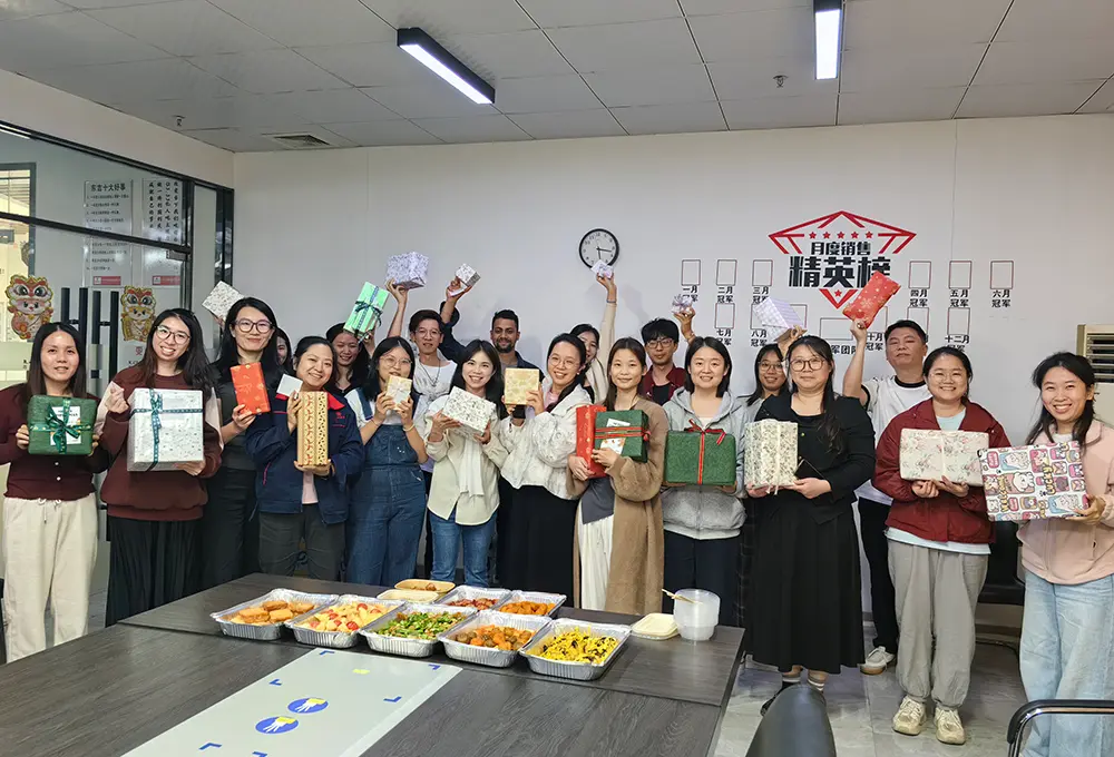Dongji sheet metal factory China engineering team of technical specialists in factory uniforms showing qualified professional manufacturing workforce